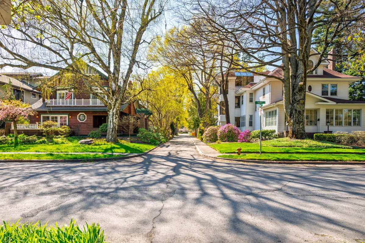 Historic residential neighborhood with tree-lined streets representing classic New England architecture similar to Lynn, Massachusetts